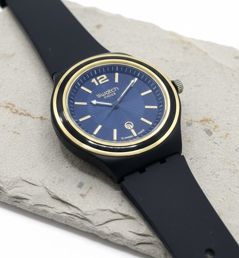 ساعة Swatch Swiss الزرقاء الملكية – لمسة عصرية بأناقة ذهبية خالدة